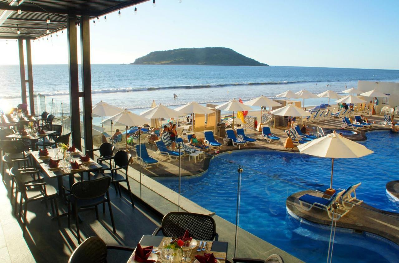 منتجع رويال فيلاز ماساتلان المظهر الخارجي الصورة View of the beach at the Hard Rock Hotel