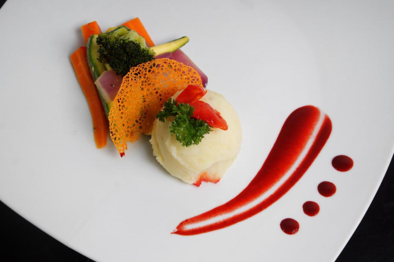 منتجع رويال فيلاز ماساتلان المظهر الخارجي الصورة A plate of food